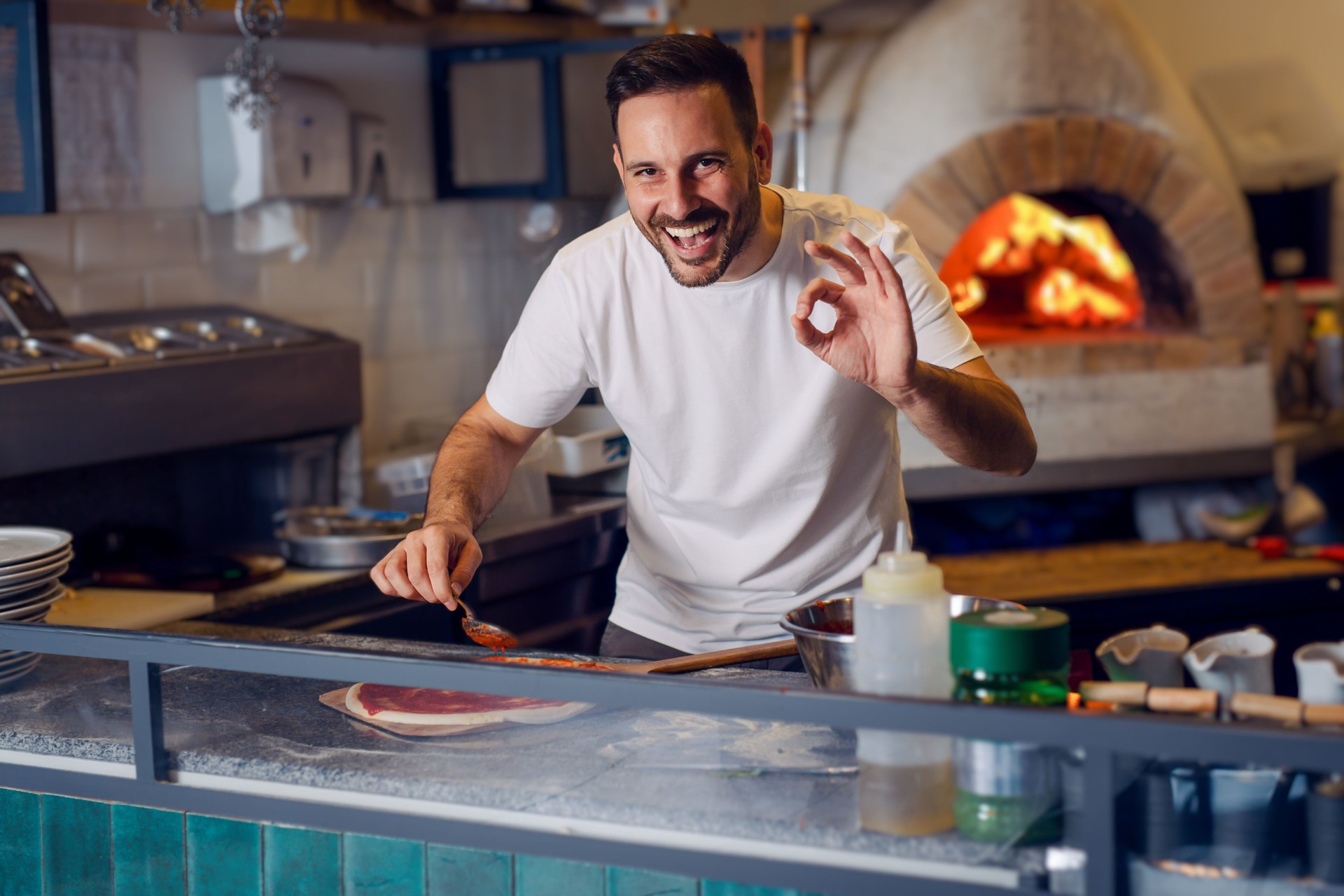 Pizza chef working in the kitchen